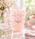 Bow monogram frosted party cups for a baby girl shower