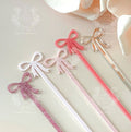 Pink bow acrylic drink stirrers for baby shower