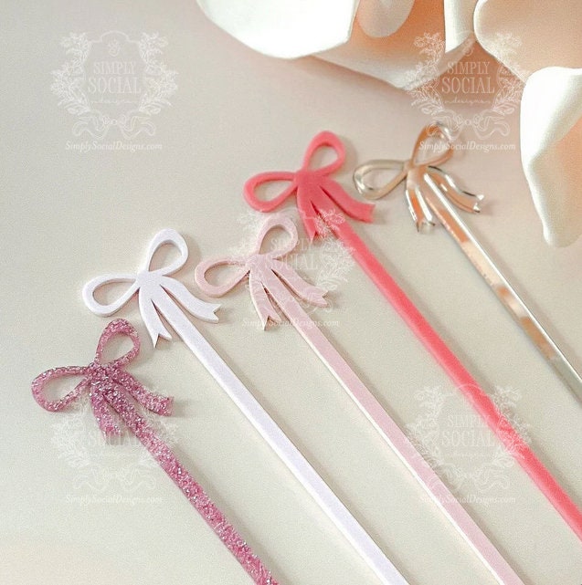 Pink bow acrylic drink stirrers for baby shower