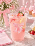 Pink bow frosted party cups for baby shower and bridal shower